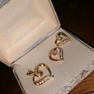 Gold earrings and charm
